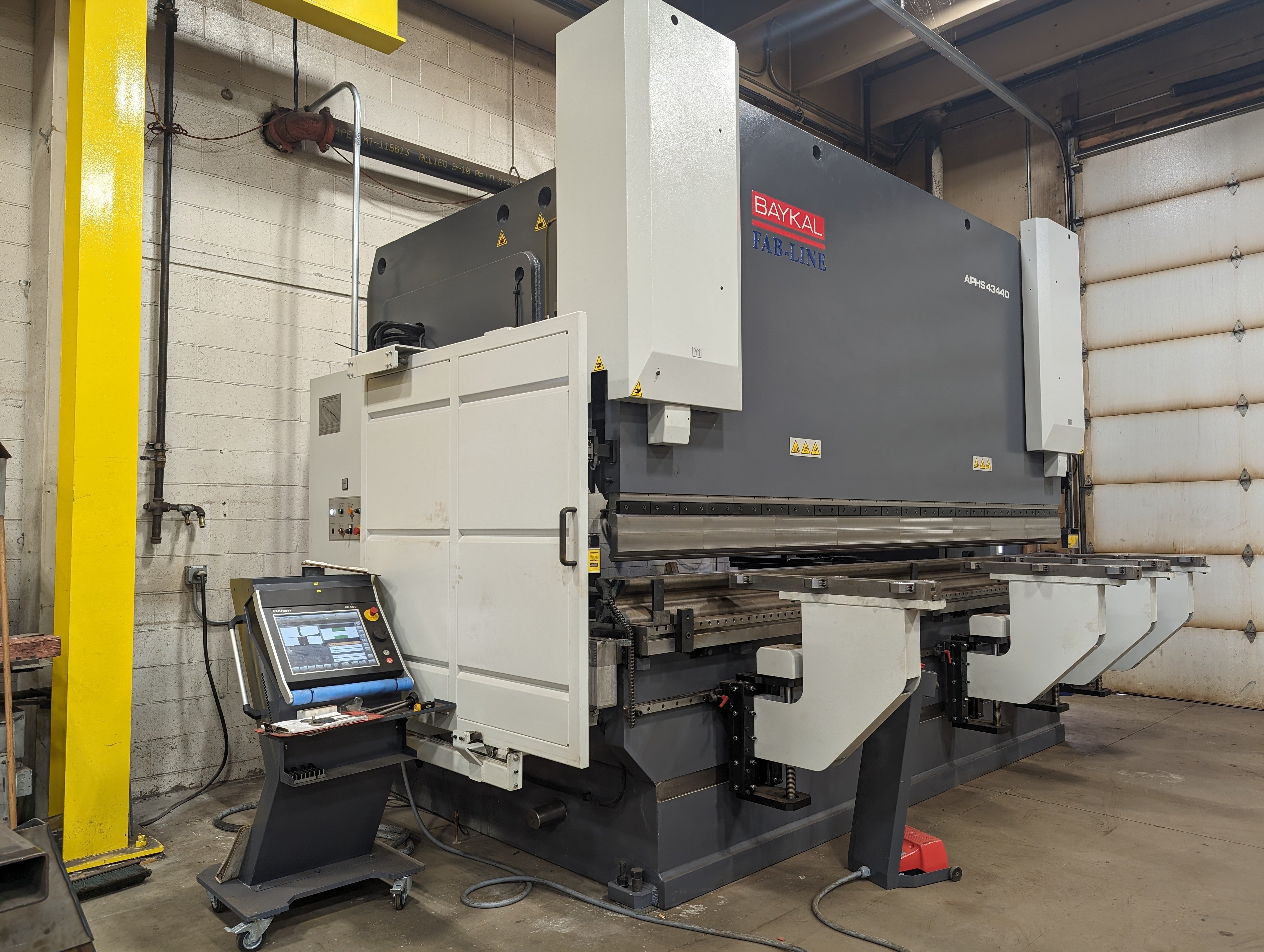 Baykal AHPS 43440 440-ton press brake was installed in our fabrication shop expanding our ability to bend various material thickness and parts with larger leg lengths due to increased clearance